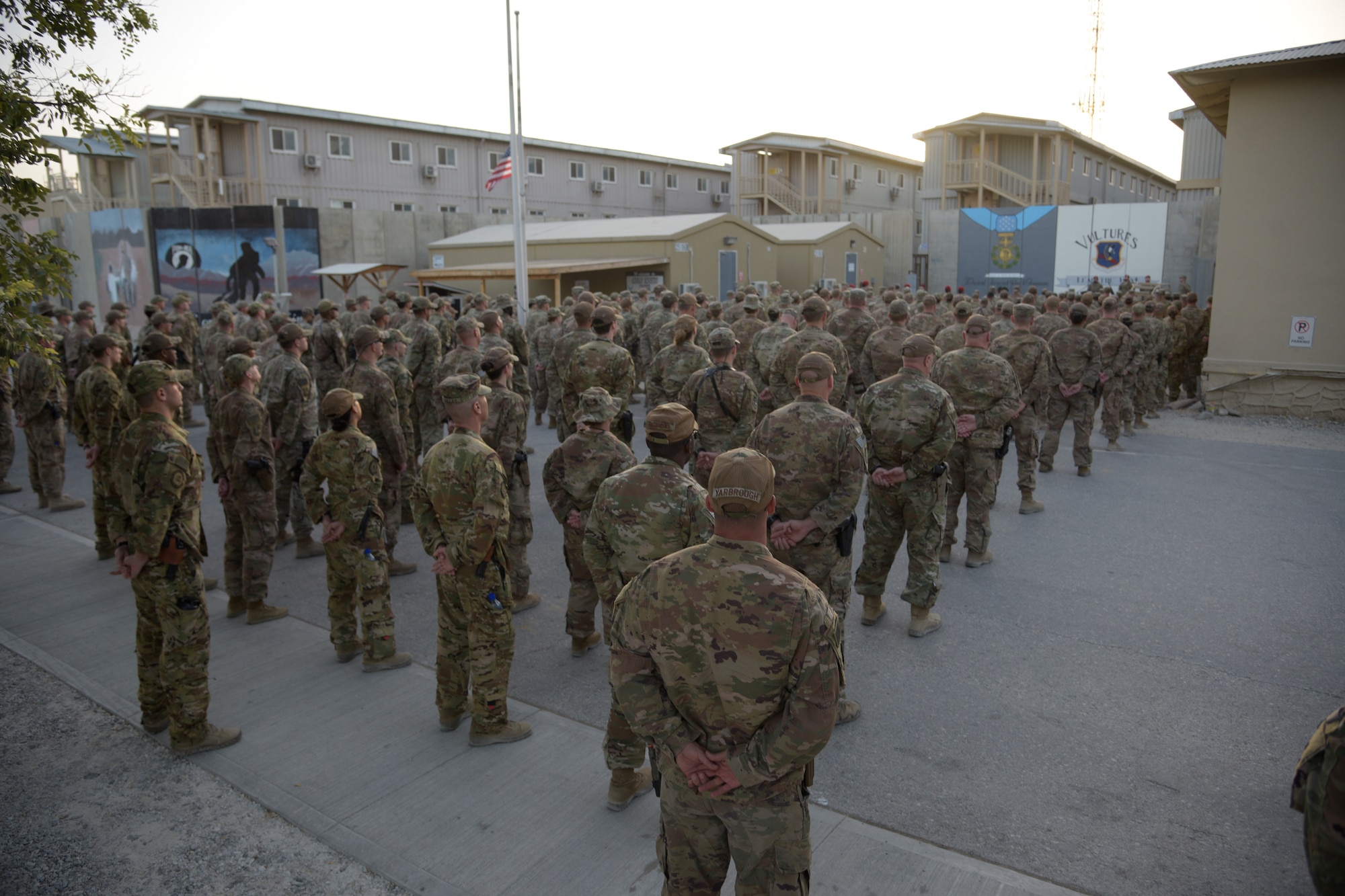 Bagram team members gather in Memorial Courtyard in remembrance of Medal of Honor recipient, U.S. Air Force Master Sgt. John Chapman during a ceremony on Bagram Airfield, Afghanistan, August 28, 2018. Chapman was posthumously awarded the MOH for his actions during the Battle of Takur Ghar, also known as Roberts Ridge, in Afghanistan in March 2002. (U.S. Air Force photo by Staff Sgt. Kristin High)