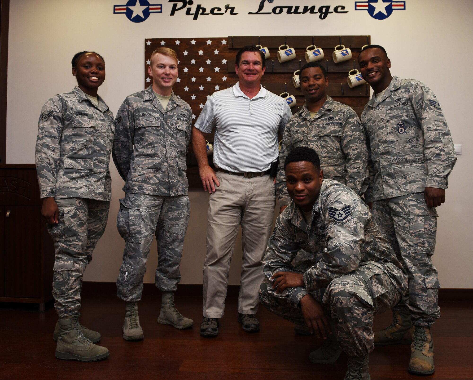 Rep. Austin Scott  poses weith the Airmen of Incirlik Air Base.