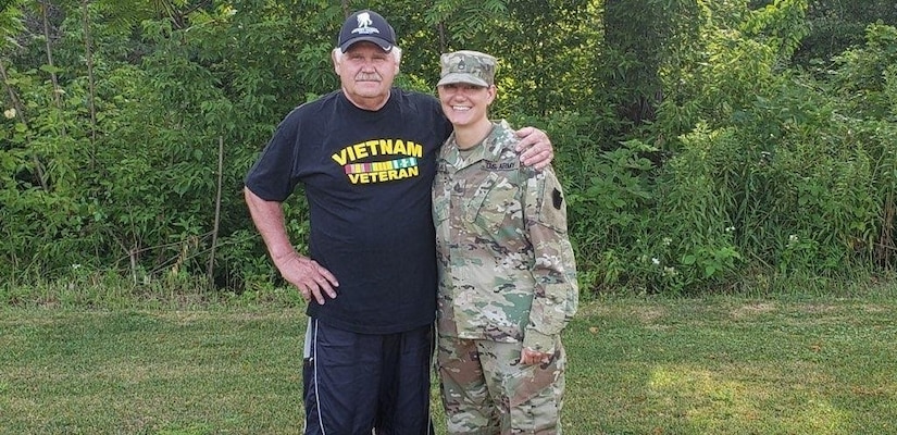 John Schilinski and his daughter, Army Staff Sgt. Rachel Kovach, a squad leader with the Pennsylvania Army National Guard’s 2nd Platoon, Alpha Company, 1st Battalion, 112th Infantry Regiment, strengthened their family ties when Kovach became an infantry soldier. Pennsylvania Army National Guard photo by Maj. Gregory McElwain