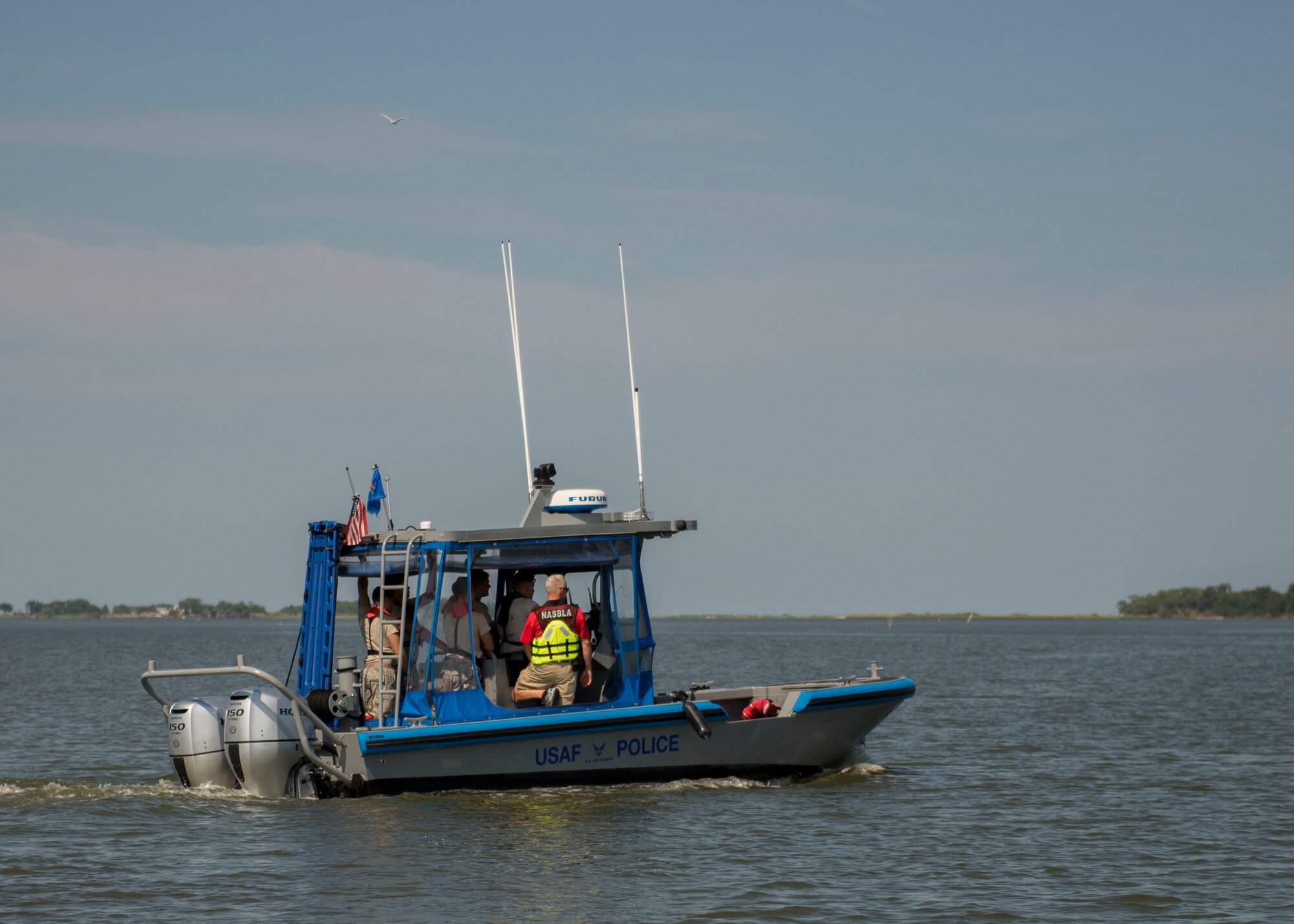 U.S. Air Force Airmen assigned to the 633rd Security Forces Squadron practice boat operations at Joint Base Langley-Eustis, Virginia, Aug. 14, 2018.