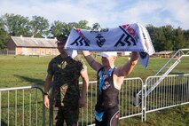 Triathletes compete in the Quantico Triathlon (Quantico Tri) hosted by Marine Corps Base Quantico (MCBQ), Va., Aug.25, 2018. The Quantico Tri is a three part event consisting of a 750 meter open water swim, a 20K cycle tour of MCBQ, and a 5K run.(U.S. Marine Corps Photo by; Lance Cpl Donte Busker)