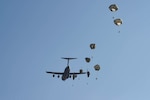 Paratroopers from the 82nd Airborne Division jump from a C-17 Globemaster III from McChord Field, Wash., during Exercise Predictable Iron at Pope Field, N.C., Aug 23, 2018. Airmen from the 62nd Airlift Wing worked alongside the Army to drop equipment and personnel during the exercise. (U.S. Air Force photo by Senior Airman Tryphena Mayhugh)