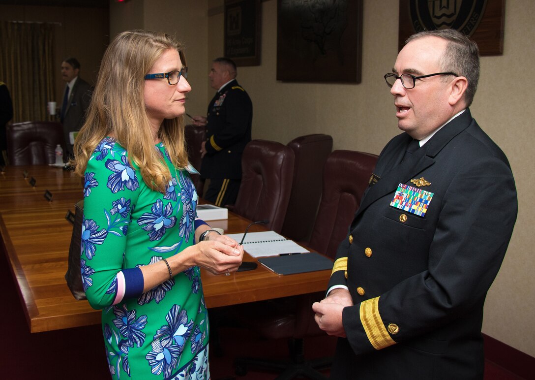 Rear Adm. Shepard Smith, Mississippi River Commission member, speaks with partners and the public before the annual low-water inspection public hearing in Vicksburg, Mississippi, Aug. 22, 2018.