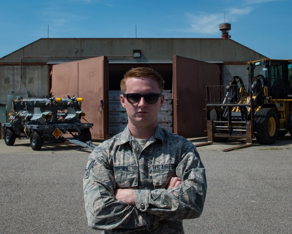 U.S. Air Force Senior Airman Michael Brown, 1st Maintenance Squadron munitions storage crew chief stands at the ‘bomb dump’ at Joint Base Langley-Eustis, Virginia, May 3, 2018.