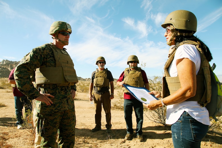 California State Assemblyman Chad Mayes’ Field Representative Beth Bogue, right, presents BGen Roger B. Turner Jr., Combat Center Commanding General, with a certificate of recognition commemorating the live-fire training exercise conducted in the Galway Lake Training Area in the Johnson Valley Exclusive Military Use Area, Marine Corps Air Ground Combat Center, Twentynine Palms, Calif., Aug. 24, 2018. (Marine Corps photo by Kelly O'Sullivan)