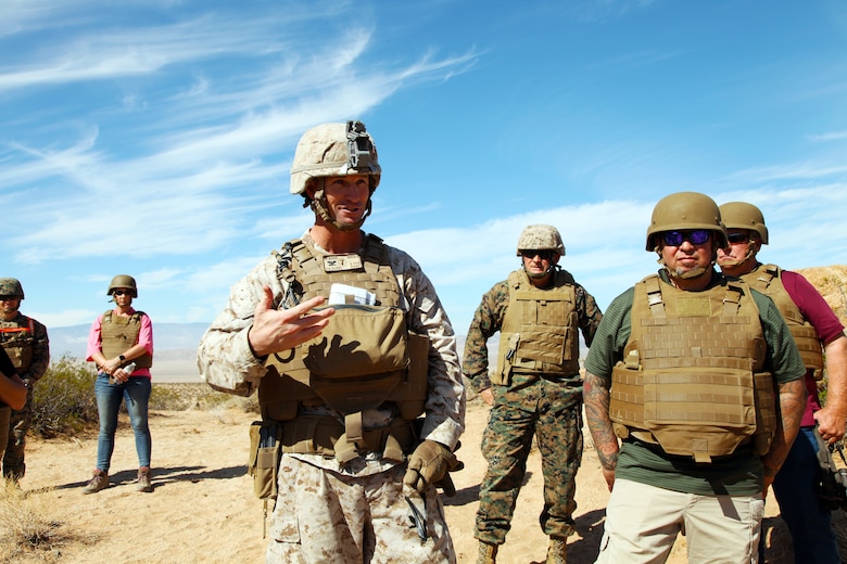 Col. Kyle B. Ellison, Commanding Officer, 7th Marine Regiment, talks about the importance of training in Johnson Valley after a 40-minute live-fire exercise conducted by India Company, 3rd Battalion, 4th Marines, 7th Marine Regiment, in the Galway Lake Training Area in the Johnson Valley Exclusive Military Use Area, Marine Corps Air Ground Combat Center, Twentynine Palms, Calif., Aug. 24, 2018. (Marine Corps photo by Kelly O'Sullivan)