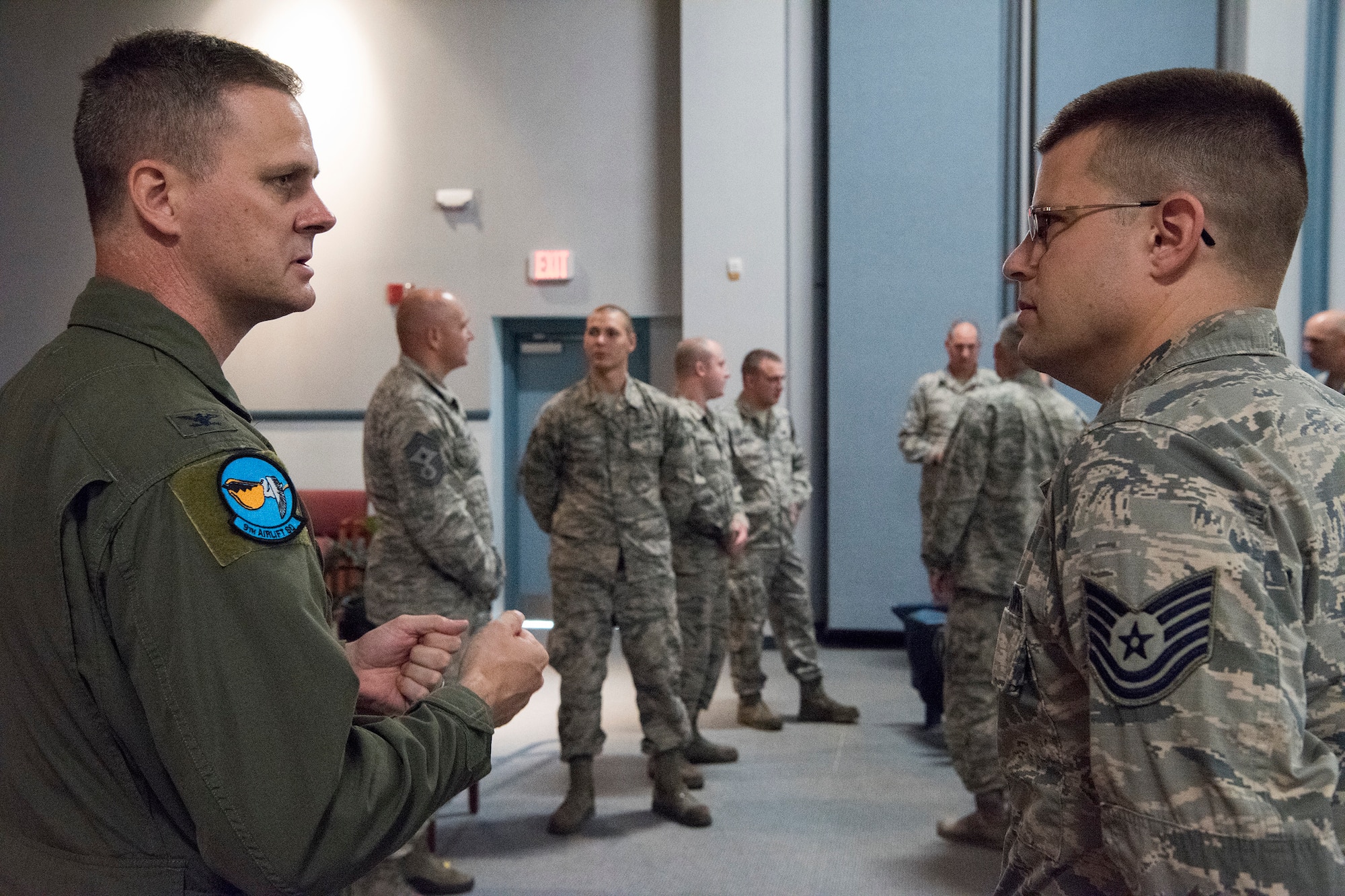 Col. Joel Safranek (left), 436th Airlift Wing commander, speaks with Tech. Sgt. Emmanuel Jacoby, 436th Maintenance Squadron, Operating Location Alpha, regional isochronal inspection floor chief, after a commander’s call Aug. 23, 2018, at Westover Air Reserve Base, Mass. Safranek was one of six leaders from Dover Air Force Base, Del., who visited Airmen assigned to the geographically separated maintenance unit. (U.S. Air Force photo by Staff Sgt. Zoe Russell)