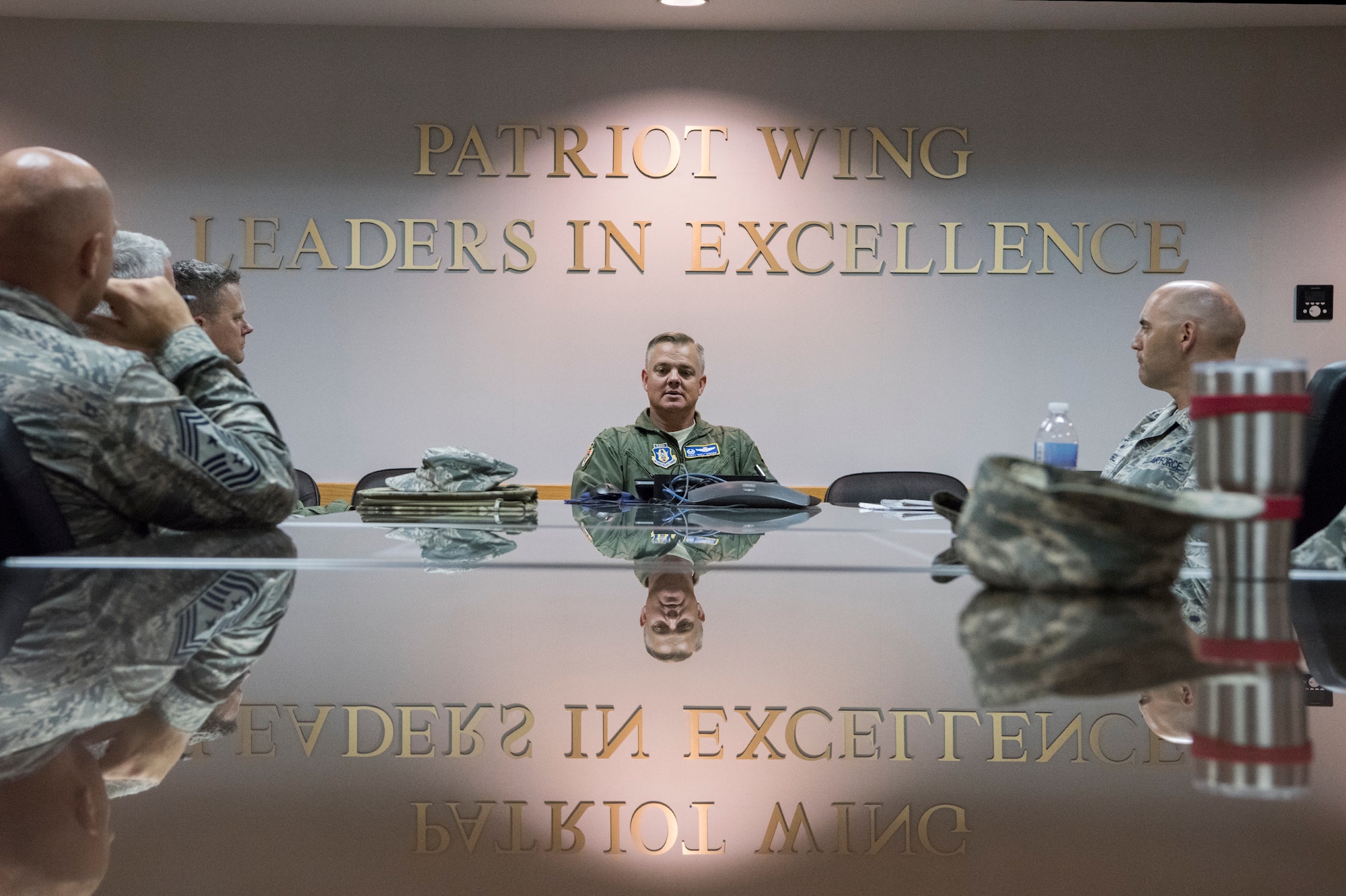 Col. D. Scott Durham, 439th Airlift Wing commander, discusses mission capabilities with 436th Airlift Wing leaders Aug. 22, 2018, at Westover Air Reserve Base, Mass. There are currently 44 active duty Airmen assigned to the 436th Maintenance Squadron, Operating Location Alpha, who assist reserve and civilian employees with completing every minor isochronal inspection for the entire Air Force C-5 fleet. (U.S. Air Force photo by Staff Sgt. Zoe Russell)