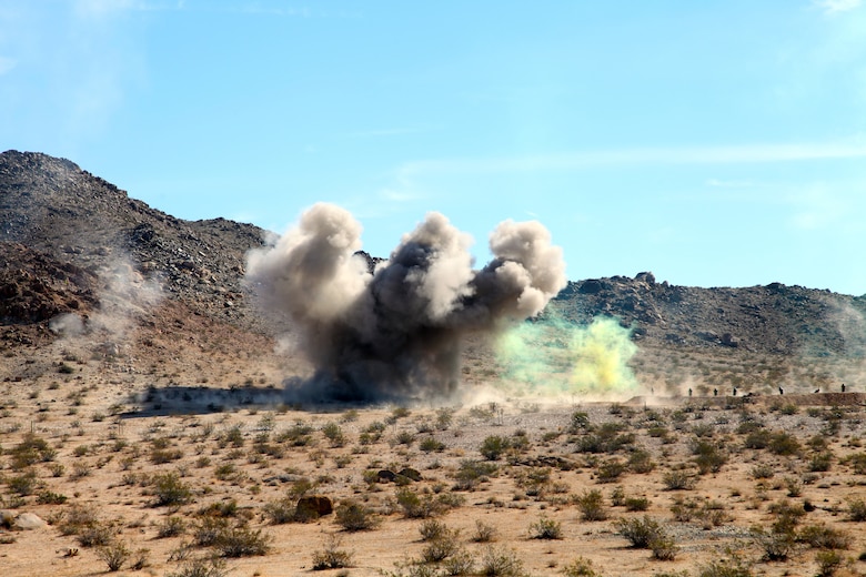 Impact from an Anti-Personnel Obstacle Breaching System (APOBS) throws up a large plume near an objective during live-fire training conducted by India Company, 3rd Battalion, 4th Marines, 7th Marine Regiment, in the Galway Lake Training Area in the Johnson Valley Exclusive Military Use Area, Marine Corps Air Ground Combat Center, Twentynine Palms, Calif., Aug. 24, 2018. (Marine Corps photo by Kelly O'Sullivan)