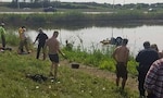 Cpl. Nathan Jennings of the Illinois National Guard was among 11 rescuers who saved the life of a 26-year-woman who nearly drowned in her overturned car in a retention pond.