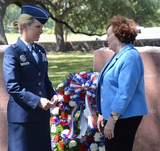 Brig. Gen. Laura L. Lenderman, 502nd Air Base Wing and Joint Base San Antonio commander, and Shirley James, former First Lady Claudia “Lady Bird” Johnson’s personal secretary, talk after the public wreath-laying ceremony Aug. 27 at the Lyndon B. Johnson National Historical Park. The park is located in Johnson City, Texas. The gravesite ceremony for the former president observes his birthday and his contributions to the nation.