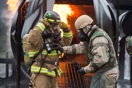 Air Force fire protection specialists conduct wartime-firefighting readiness training at JBER.