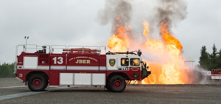 Air Force fire protection specialists conduct wartime-firefighting readiness training at JBER.