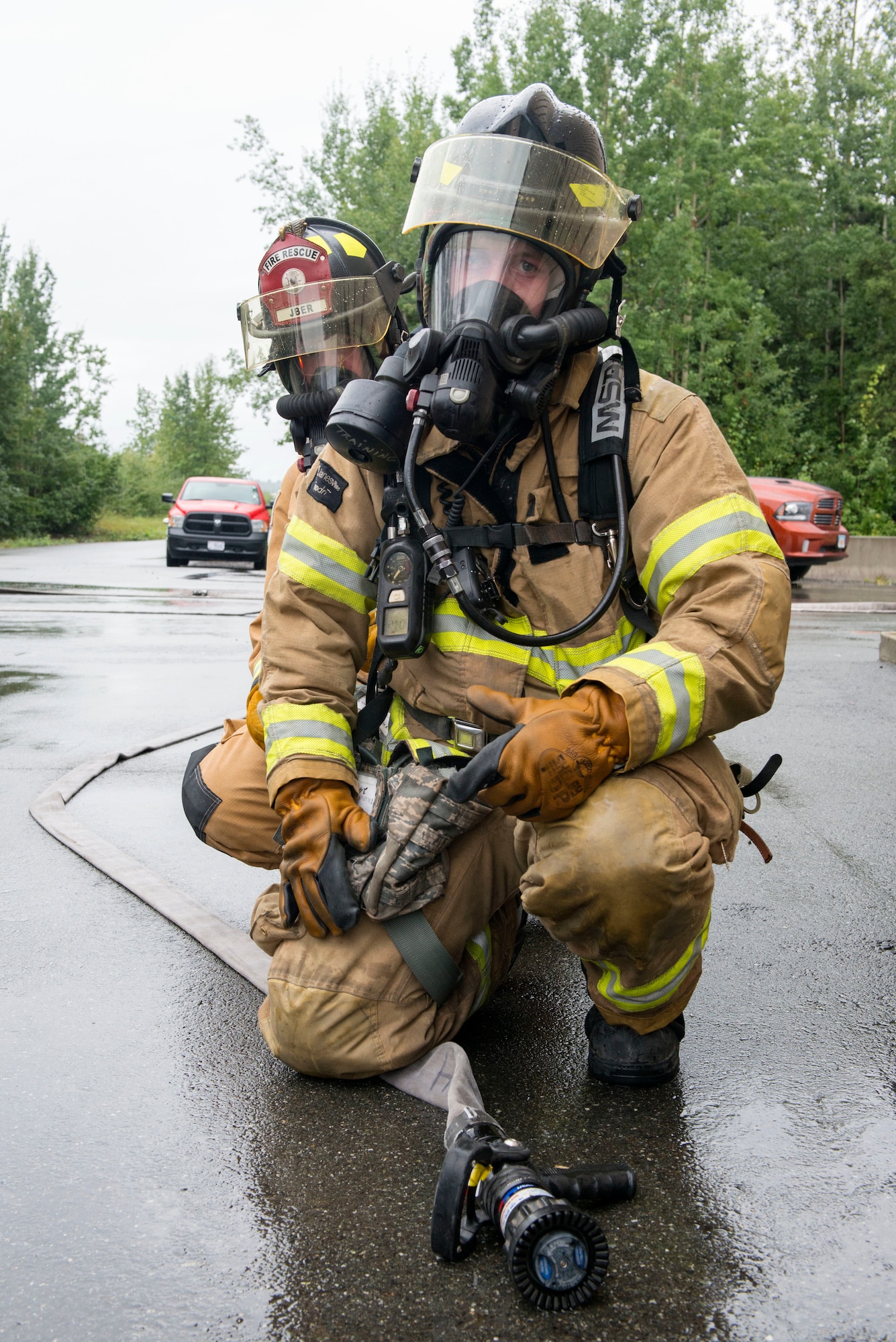 Air Force fire protection specialists conduct wartime-firefighting readiness training at JBER.