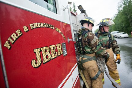 Air Force fire protection specialists conduct wartime-firefighting readiness training at JBER.