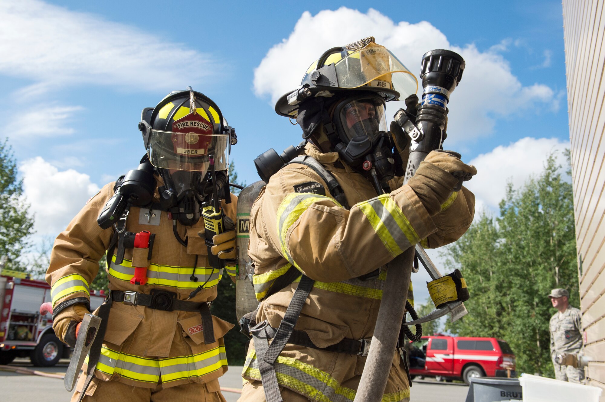 Air Force fire protection specialists conduct wartime-firefighting readiness training at JBER.