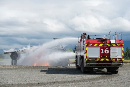 Air Force fire protection specialists conduct wartime-firefighting readiness training at JBER.
