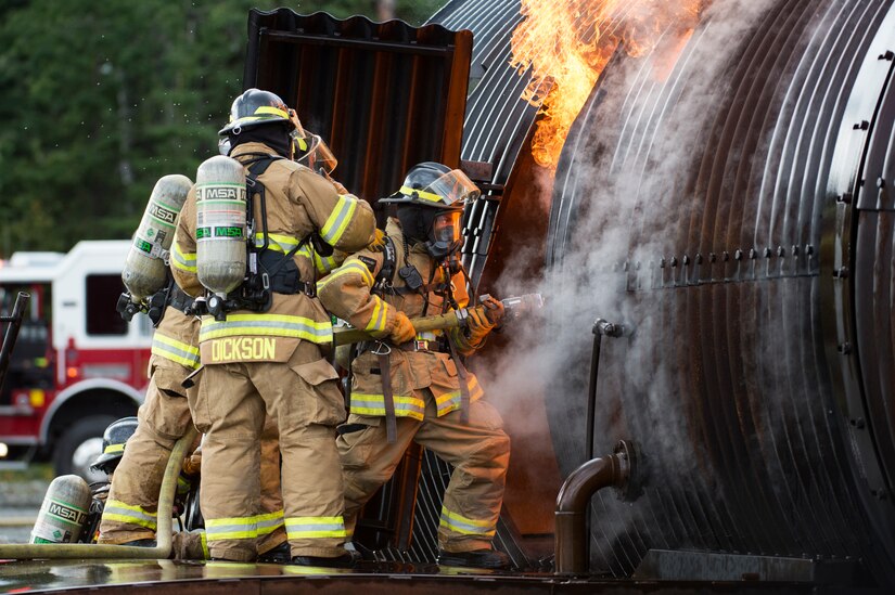 Air Force fire protection specialists conduct wartimefirefighting