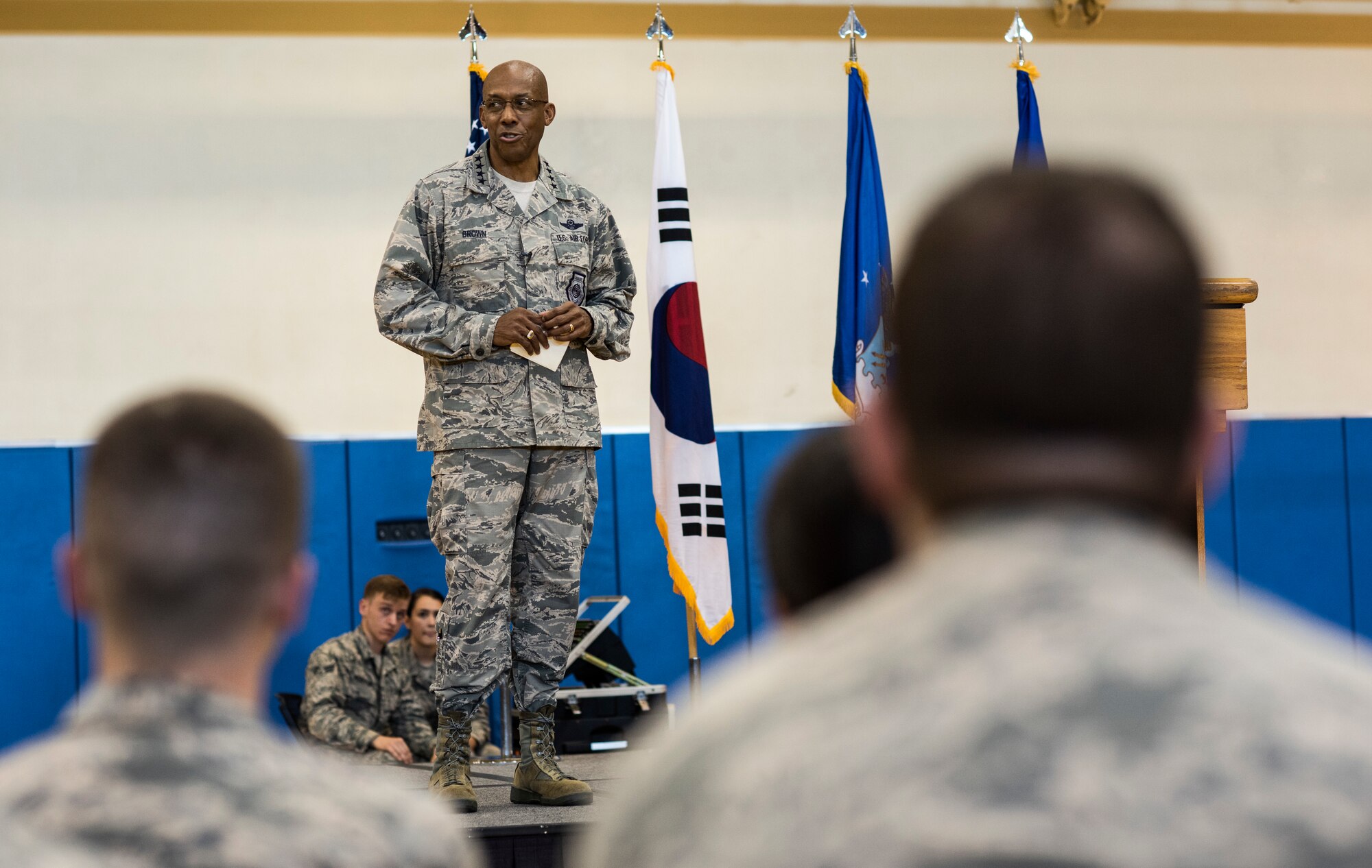 U.S. Air Force Gen. CQ Brown, Jr., Pacific Air Forces commander, briefs 8th Fighter Wing “Wolf Pack” Airmen during an all-call at Kunsan Air Base (AB), Republic of Korea, Aug. 29, 2018. Brown had the opportunity to talk directly to 8th Fighter Wing Airmen about his priorities for the Indo-Pacific region and to relate personal experiences from his time as a previous pilot and wing commander at Kunsan AB. (U.S. Air Force photo by Senior Airman Stefan Alvarez)