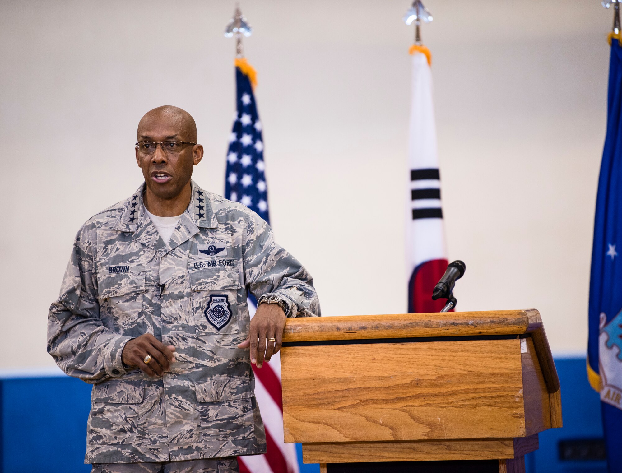 U.S. Air Force Gen. CQ Brown, Jr., Pacific Air Forces commander, speaks to 8th Fighter Wing “Wolf Pack” Airmen during an all-call at Kunsan Air Base, Republic of Korea, Aug. 29, 2018. In addition to the all-call, Brown interfaced with 8th Fighter Wing Airmen throughout the day’s activities, including a security forces demonstration, an air traffic control brief and maintenance operations brief. (U.S. Air Force photo by Senior Airman Stefan Alvarez)