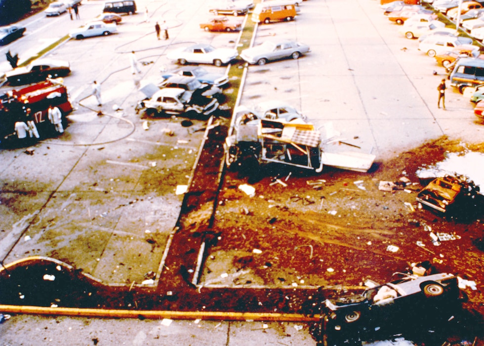 The explosion site in the parking lot of the U.S. Air Forces in Europe headquarters building at Ramstein Air Base where, on August 31, 1981, the Red Army terrorist group detonated two care bombs. Air Force dentists treated 15 people wounded in the attack. (U.S. Air Force photo)