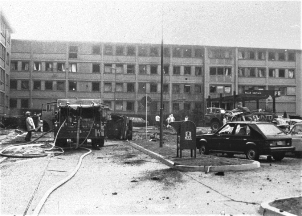 Emergency personnel respond to a terrorist bombing at US Air Force Europe headquarters on Ramstein Air Base, August 31, 1981. Air Force dental personnel from the base dental clinic located across the street from the bombing site treated the 15 people wounded in the attack. (U.S. Air Force photo)