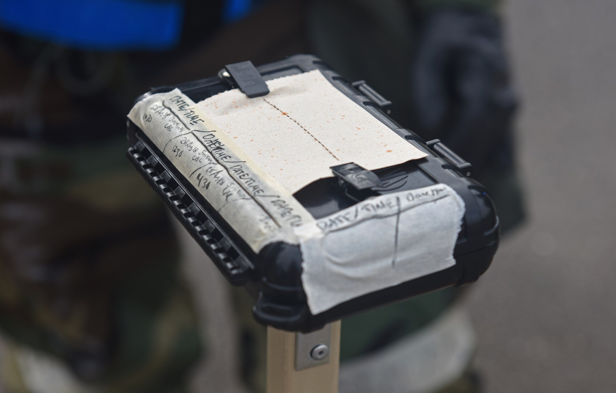 M8 chemical agent detector paper is examined by a post attack reconnaissance team during a mission assurance exercise at RAF Mildenhall, England, Aug. 28, 2018. RAF Mildenhall performs exercises so Airmen are able to display their capabilities and prepare for real-world scenarios. (U.S. Air Force photo by Airman 1st Class Brandon Esau)