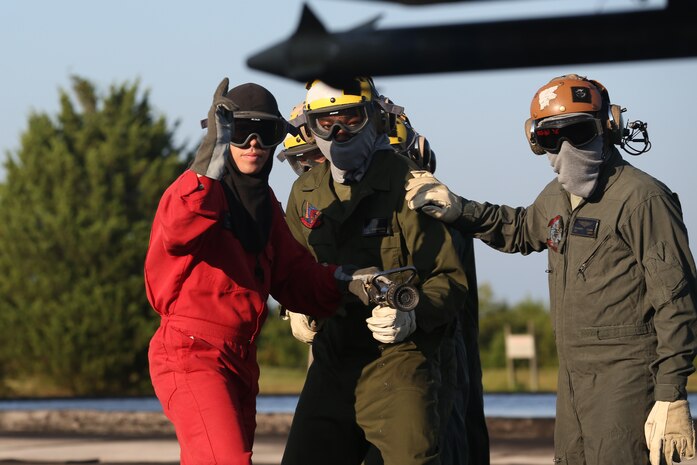 Marines conduct shipboard firefighting drills in Cherry Point, North Carolina to prepare for upcoming deployment.
