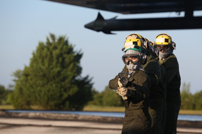 Marines conduct shipboard firefighting drills in Cherry Point, North Carolina to prepare for upcoming deployment.