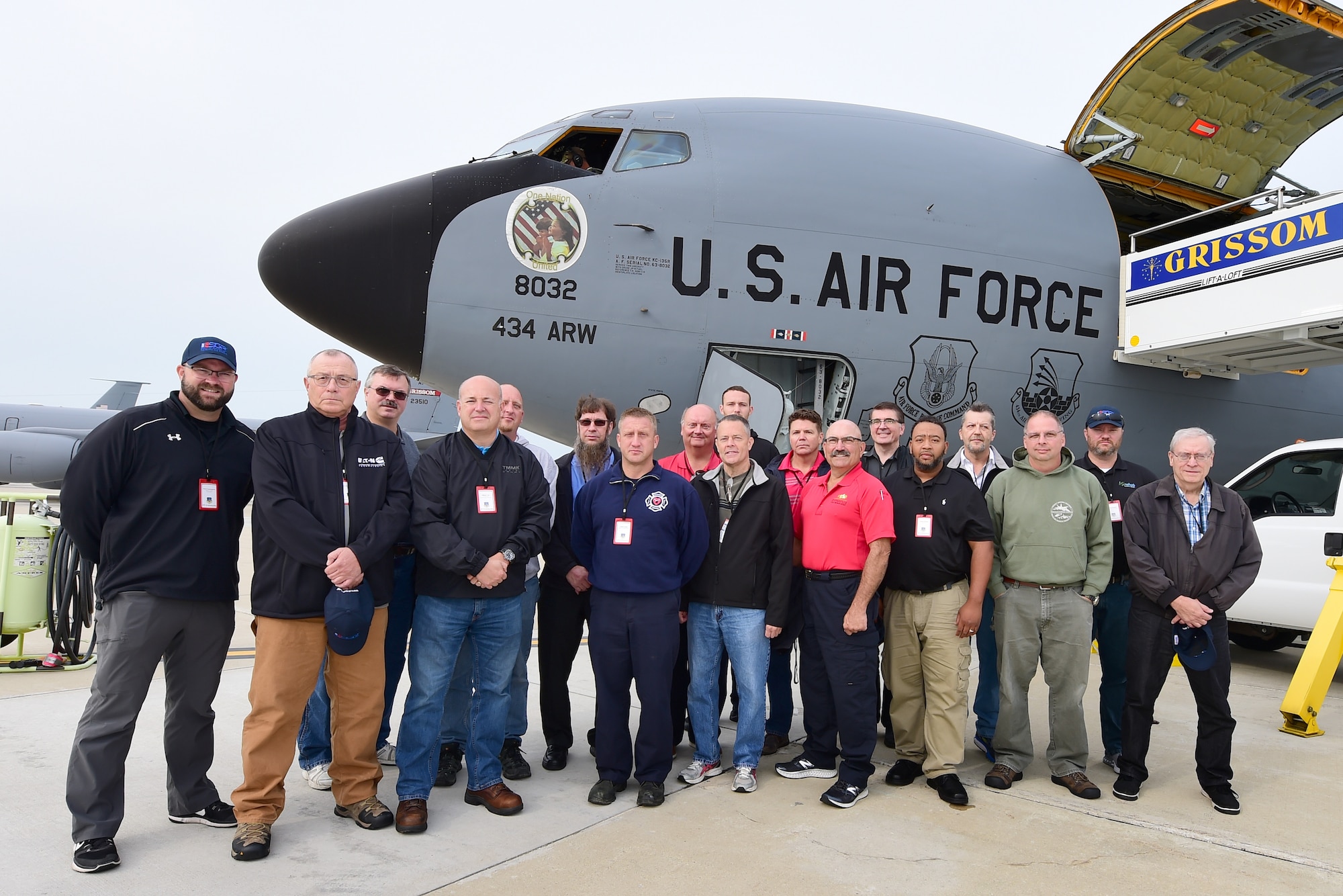 A group of employers pose for a photo in front of a KC-135R Stratotanker aircraft from the Air Force Reserve's 434th Air Refueling Wing at Grissom Air Reserve Base, Ind., before taking off on a refueling mission Aug. 24, 2018. Indiana's two flying wings partnered with Employee Support of the Guard and Reserve to fly 60 employers of guardsmen and reservists on a boss lift aimed at educating them about their employees' military service and responsibilities. (U.S. Air Force Photo/Staff Sgt. Christopher Massey)