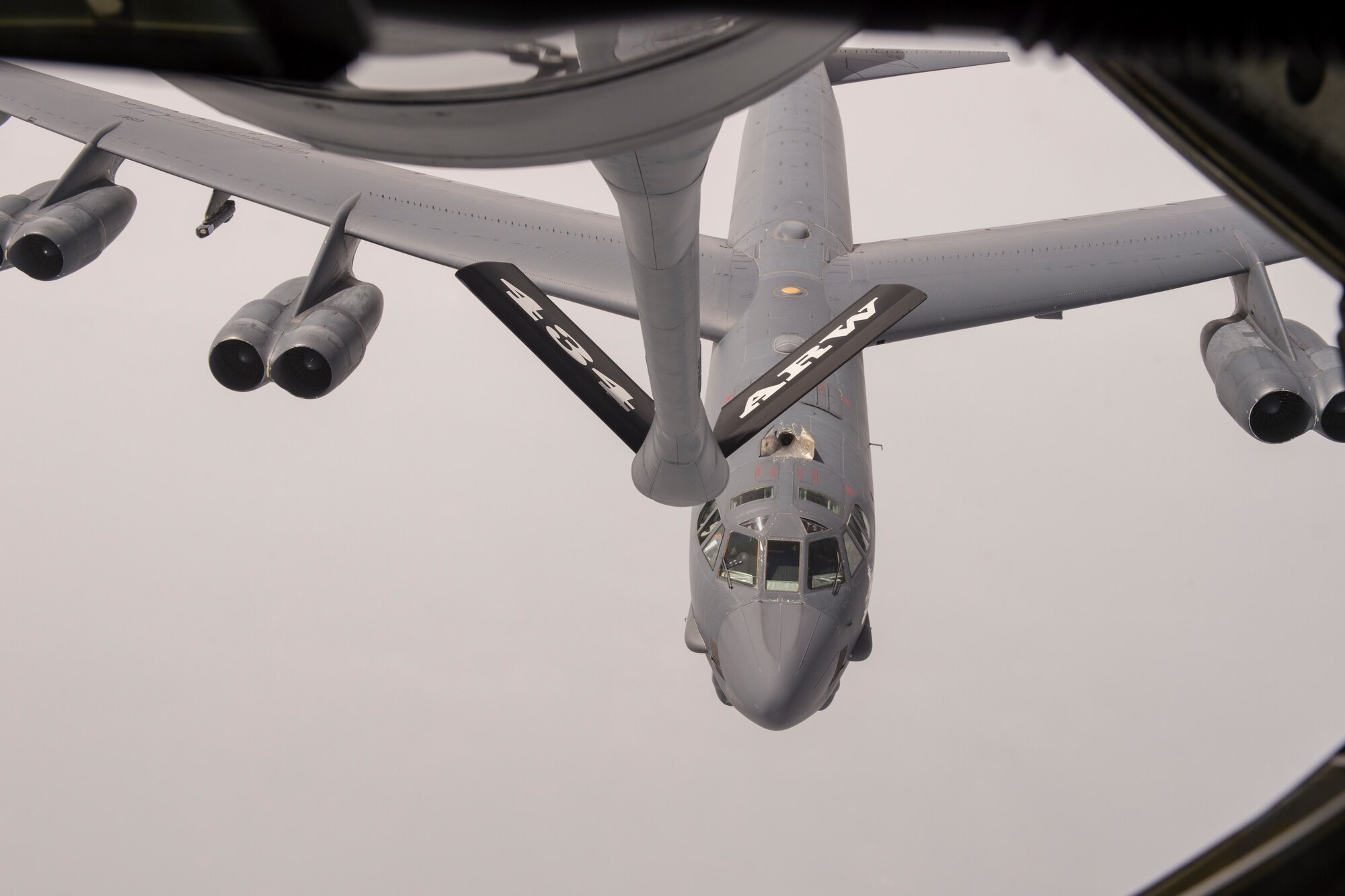 A U.S. Air Force B-52 Stratofortress from the 5th Bomb Wing, Minot Air Force Base, N.D., prepares to be refueled by a 434th Air Refueling Wing KC-135R Stratotanker during a refueling mission over the Midwest Aug. 24, 2018. Indiana's two flying wings partnered with Employee Support of the Guard and Reserve to fly 60 employers of guardsmen and reservists on a boss lift aimed at educating them about their employees' military service and responsibilities. (U.S. Air Force Photo/Staff Sgt. Christopher Massey)
