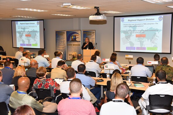 Attendees at the first Non-Standard Supply Workshop hosted by the Air Force Security Assistance and Cooperation Directorate, at the Montgomery County Business Solutions Center in Dayton, Ohio, listen to a presentation by Angela Swain, the chief of the International Logistics Branch at AFSAC. (Courtesy photo)