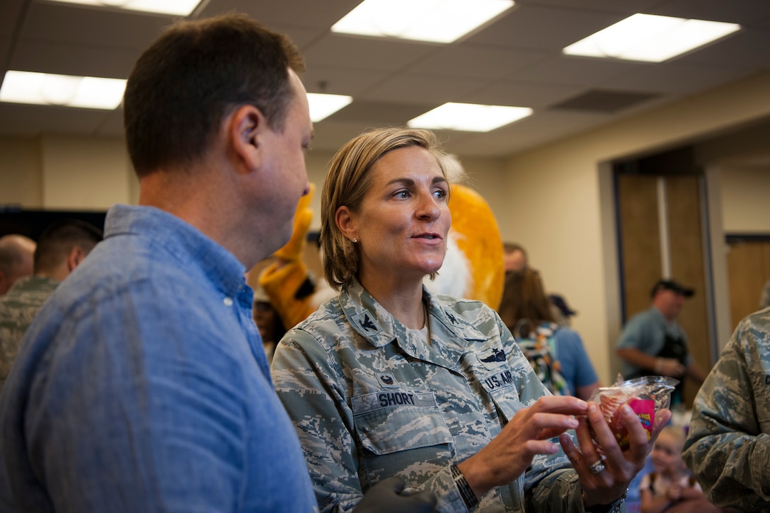 Col. Jennifer Short, right, 23d Wing commander, talks to a vendor during the Food Show at the Georgia Pines Dining Facility, Aug. 29, 2018, at Moody Air Force Base, Ga. The Food show is an innovative way to give Airmen an opportunity to try various healthy foods and give feedback. The event allowed the dining facility to focus on incorporating items that meet special dietary needs such as vegan, gluten-free, smoothie bar items and healthy snacks. (U.S. Air Force photo by Airman Taryn Butler)