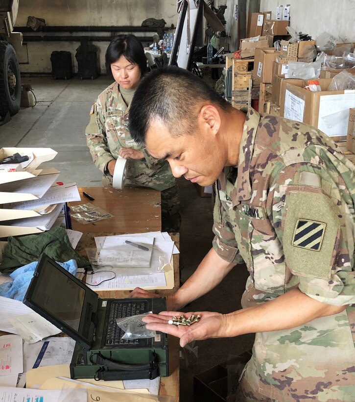 A soldier with the 26th Composite Supply Command counts parts provided by DLA during Saber Strike 2018 in Powidz, Poland. DLA is supporting the U.S. Army Europe-led exercise taking place in Estonia, Latvia, Lithuania and Poland.