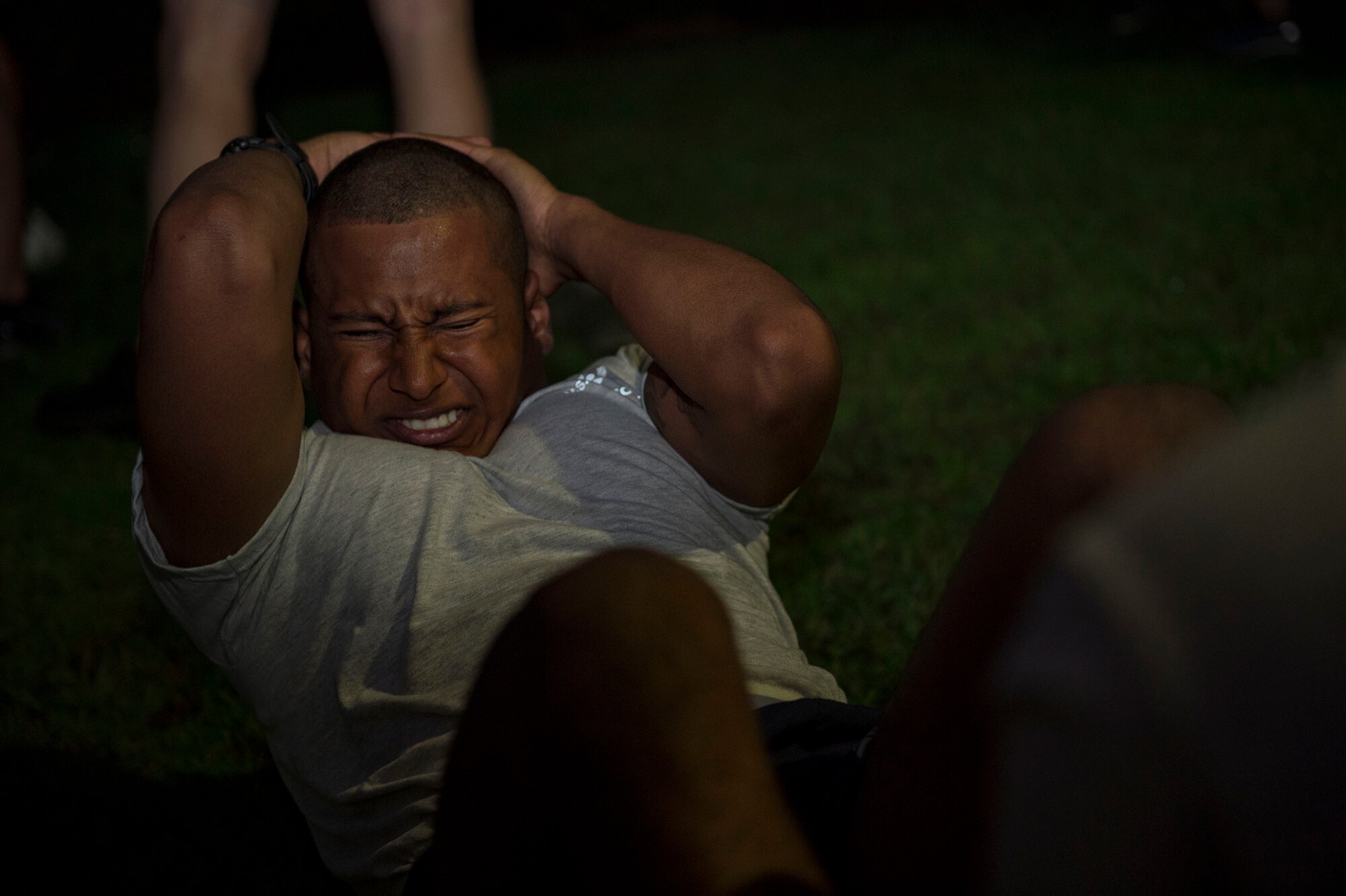 Airman 1st Class Jonathan Webster, 9th Air Support Operations Squadron Tactical Air Control Party specialist, from Fort Hood, Texas, performs sit ups during a Pre-Ranger Assessment Course, Aug. 24, 2018, at Moody Air Force Base, Ga. Moody’s 93d Air Ground Operations Wing hosted the three-day assessment which challenged approximately 20 Airmen from the 93d AGOW and 23d Wing on their physical fitness, land navigation skills, leadership qualities, water confidence and academic and tactical abilities under duress. The evaluation is designed to determine whether Airmen are ready to attend the Air Force Ranger Assessment Course held at Fort Bliss, Texas. (U.S. Air Force photo by Senior Airman Greg Nash)