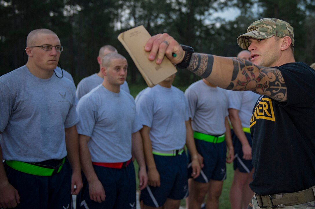 Master Sgt. Caleb Dysert, Pre-Ranger Assessment Course (Pre-RAC) instructor, shares knowledge and tactics with Airmen during a Pre-RAC, Aug. 24, 2018, at Moody Air Force Base, Ga. Moody’s 93d Air Ground Operations Wing hosted the three-day assessment which challenged approximately 20 Airmen from the 93d AGOW and 23d Wing on their physical fitness, land navigation skills, leadership qualities, water confidence and academic and tactical abilities under duress. The evaluation is designed to determine whether Airmen are ready to attend the Air Force Ranger Assessment Course held at Fort Bliss, Texas. (U.S. Air Force photo by Senior Airman Greg Nash)