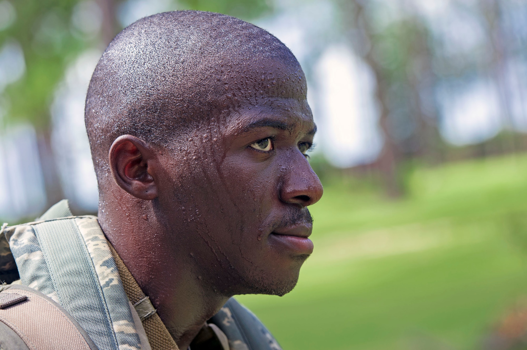Sweat pours down the face of Airman 1st Class Brandun Spearman, 347th Operations Support Squadron aircrew flight equipment technician, during a Pre-Ranger Assessment Course, Aug. 26, 2018, at Moody Air Force Base, Ga. Moody’s 93d Air Ground Operations Wing hosted the three-day assessment which challenged approximately 20 Airmen from the 93d AGOW and 23d Wing on their physical fitness, land navigation skills, leadership qualities, water confidence and academic and tactical abilities under duress. The evaluation is designed to determine whether Airmen are ready to attend the Air Force Ranger Assessment Course held at Fort Bliss, Texas. (U.S. Air Force photo by Senior Airman Greg Nash)