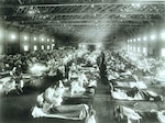 Soldiers suffering from influenza at the hospital in Camp Funston, Kansas, in 1918. Camp Funston was where the influenza epidemic which would kill more than 50 million people world-wide, including 675,000 Americans, first made a major appearance. Troops from the camp carried the virus to other Army bases during World War I.
