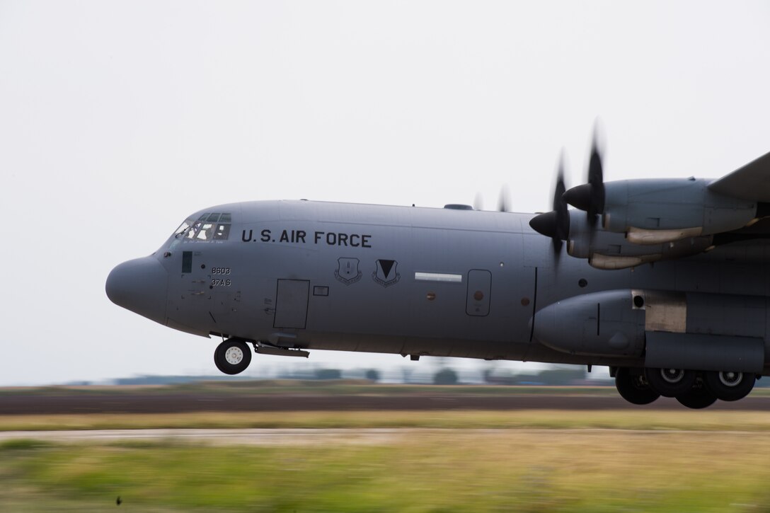 A U.S. Air Force C-130J Super Hercules aircraft assigned to the 37th Airlift Squadron, Ramstein Air Base, Germany, lands on Boboc Air Base, Romania, Aug. 23, 2018. Romanian air force paratroopers boarded the aircraft before performing static-line drops as part of exercise Carpathian Summer 2018. (U.S. Air Force photo by Senior Airman Devin Boyer)