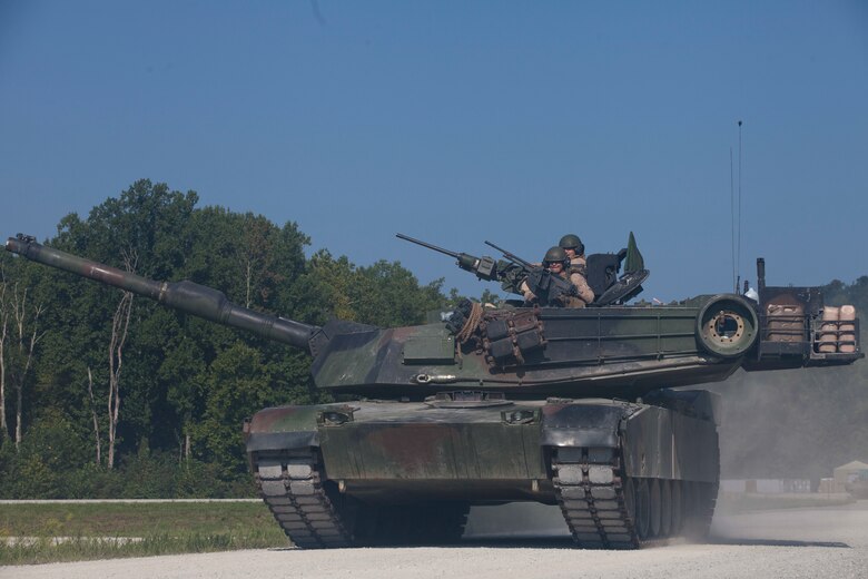 A crew of Marines from 4th Tank Battalion drive onto Wilcox range to compete in the 15th annual Tiger Competition, Aug. 28, 2018 in Fort Knox, Kentucky. The competition highlights the critical and quick-reacting combat skills of the participating battalions. (U.S. Marine Corps photo by Lance Cpl. Tessa D. Watts)
