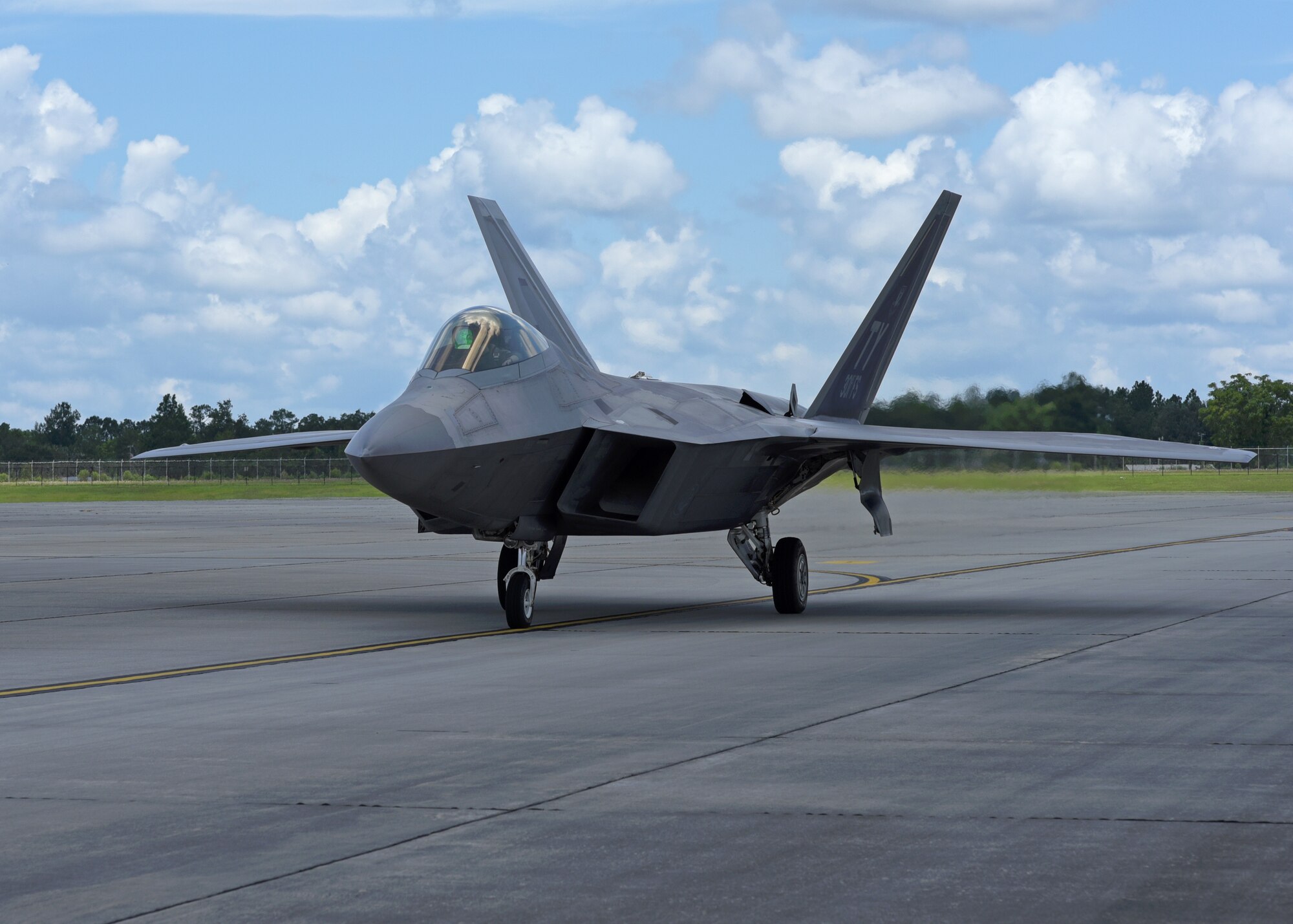 A 95th Fighter Squadron F-22 Raptor from Tyndall Air Force Base, Florida, sits on the flightline during exercise Stealth Guardian at Moody Air Force Base, Georgia, Aug. 10, 2017. In order to become a qualified F-22 pilot, Tyndall student pilots from the 43rd Fighter Squadron have to complete a vigorous course of instruction that included academics events, examinations, sorties and simulator missions. (U.S. Air Force photo by Airman 1st Class Isaiah J. Soliz)