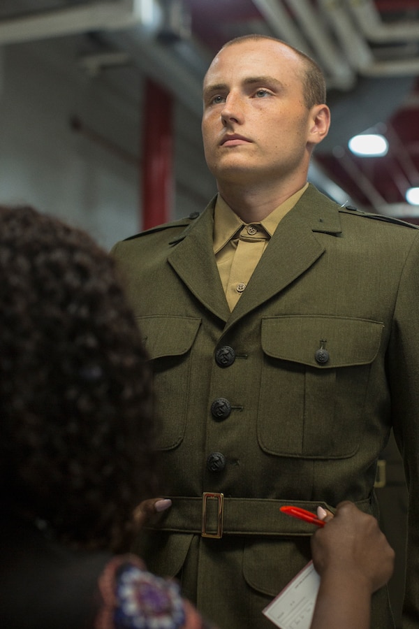 Rct. Davis Peters, with Hotel Company, 2nd Recruit Training Battalion, has his Service Alpha uniform tailored at Marine Corps Recruit Depot Parris Island, S.C., Aug. 29, 2018. Recruits receive a standard clothing issue during recruit training.