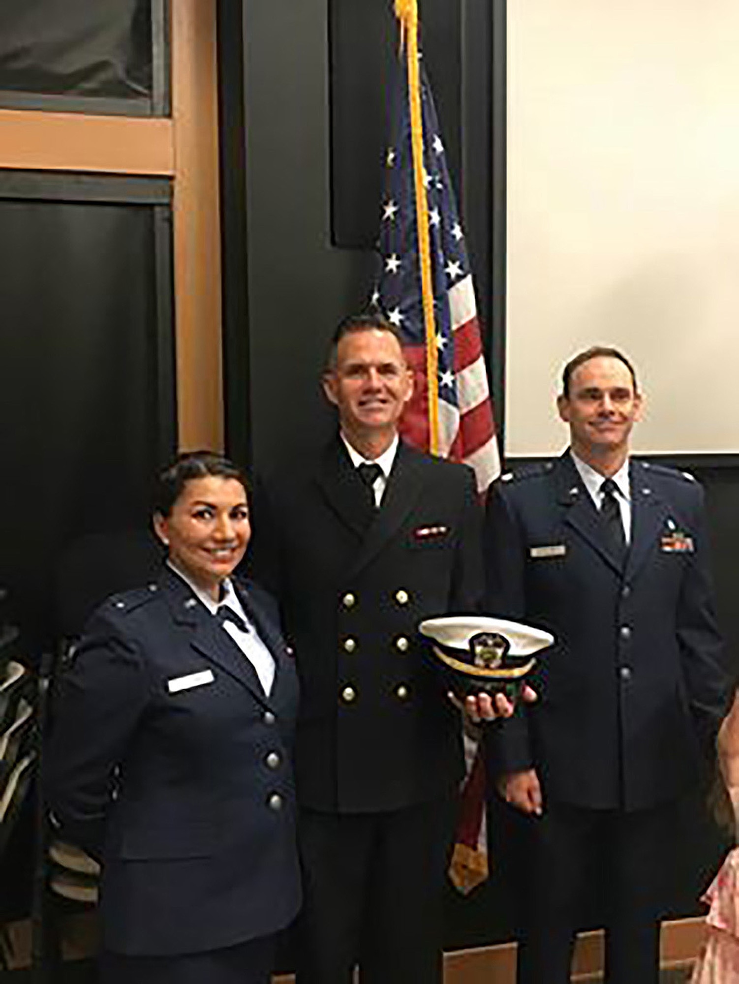 Maj. Jason Vallot, 1st Lt. Yvette Queen, 349th Air Mobility Wing, and U.S. Navy Lt. Commander Timothy Frantz, joined family members  for a memorial dedication ceremony, Aug. 25, 2018 Crescent Crater, Mt. Lassen National Park, Calif.