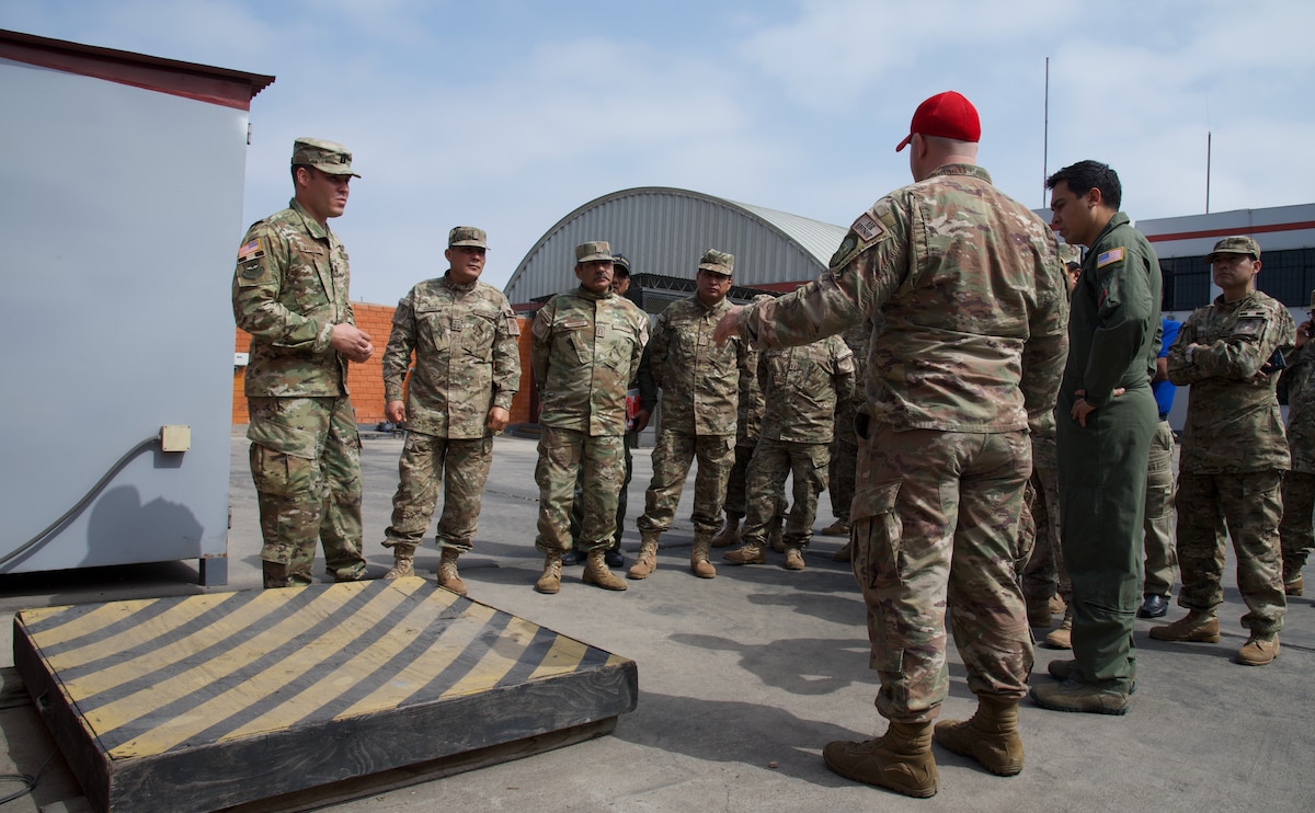 Air advisors from the 571st Mobility Support Advisory Squadron lead a discussion at Air Mobility Command’s terminal located in Callao Air Base, Lima, Peru. The visit provided an excellent opportunity for the students to see AMC’s best practices in action, which provided a tangible link to the leadership practices taught in the classroom. (courtesy photo)