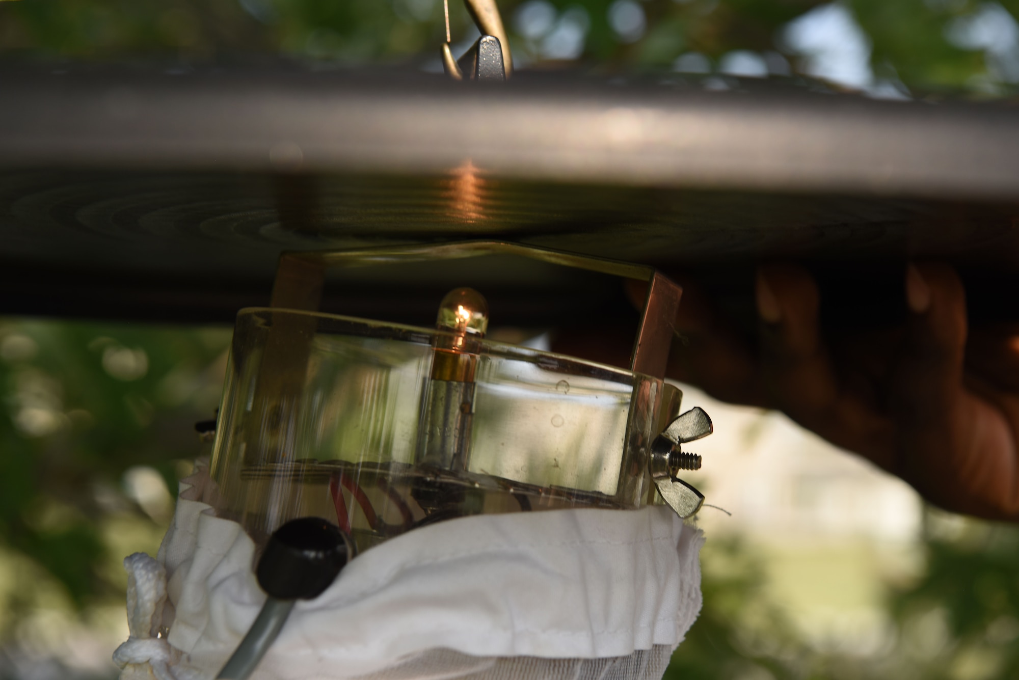 A trap is readied to collect mosquito specimen at Ellsworth Air Force Base, S.D., Aug. 13, 2018. Members assigned to the 28th Medical Group public health flight capture mosquitoes on a continuous basis to be sent off and tested for diseases, such as the West Nile virus. (U.S. Air Force photo by Airman 1st Class Thomas Karol)