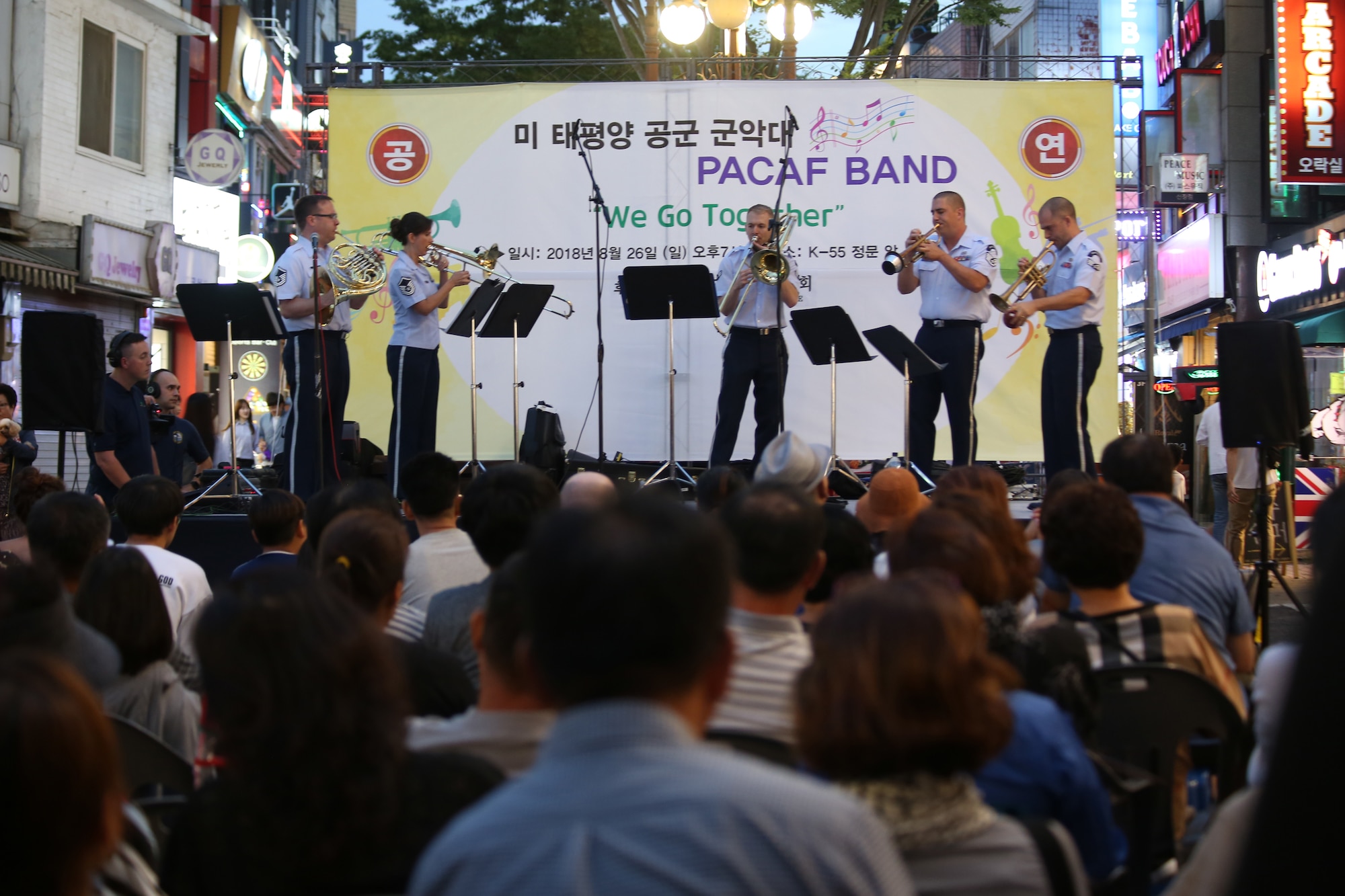 Pacific Brass from the Pacific Air Forces Band at Yokota Air Base, Tokyo, Japan, plays an arrangement during the Seventh Air Force Friendship Concert right outside Osan Air Base, Republic of Korea, Aug. 26. More than 150 people attended the hour-long concert aimed at building stronger friendships with local community partners and residents. (U.S. Air Force photo by Master Sgt. Nadine Barclay)