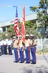 A U.S. Marine color guard carries the colors during a commemoration ceremony Aug. 7, 2018 at Honiara, Guadalcanal, Solomon Islands. U.S. Marines and Sailors with 3rd Marine Logistics Group joined U.S. Coast Guardsmen and the members of the Solomon Island government at the ceremony to commemorate the 76th anniversary of the U.S. Marines and Allied forces landing on the island of Guadalcanal, marking the beginning of the Pacific island-hopping campaign of World War II. (Courtesy Photo)