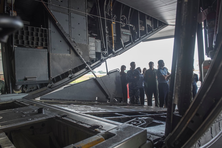 Foreign air force members view corrosion prevention and repair techniques during the 2018 Fighter Logistics and Safety Symposium Aug. 29, 2018, at Kadena Air Base, Japan. Air force officers from Malaysia, Japan, Bangladesh, Sri Lanka, Thailand, Australia, Indonesia and India attended the symposium to boost fighter interoperability within the Pacific region.