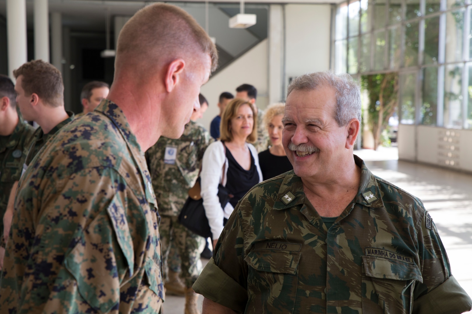 Brazilian Naval Infantry Rear Adm. Nelio de Almeida speaks to U.S. Marine Col. Kevin Jarrard