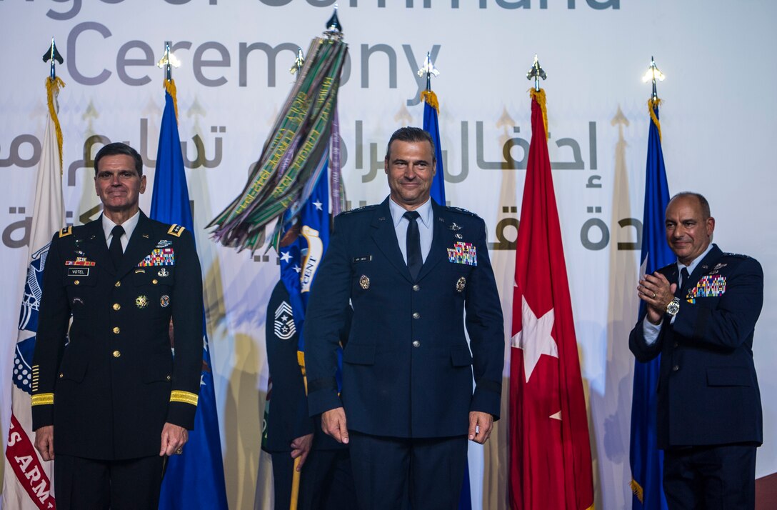 Army Gen. Joseph L. Votel, U.S. Central Command commander, stands with Air Force Lt. Gen. Joseph T. Guastella Jr., U.S. Air Forces Central Command commander, and Air Force Lt. Gen. Jeffrey L. Harrigian, outgoing AFCENT commander, during a change of command ceremony at Al Udeid Air Base, Qatar, Aug. 30, 2018. Guastella entered the Air Force in 1987 as a graduate of the U.S. Air Force Academy. He has flown the F-16 Fighting Falcon and A-10 Thunderbolt II, served as the wing commander of the 455th Air Expeditionary Wing at Bagram Airfield, Afghanistan, has had multiple combat tours and instructed at the U.S. Air Force Fighter Weapons School. (U.S. Air Force photo by Senior Airman Xavier Navarro)